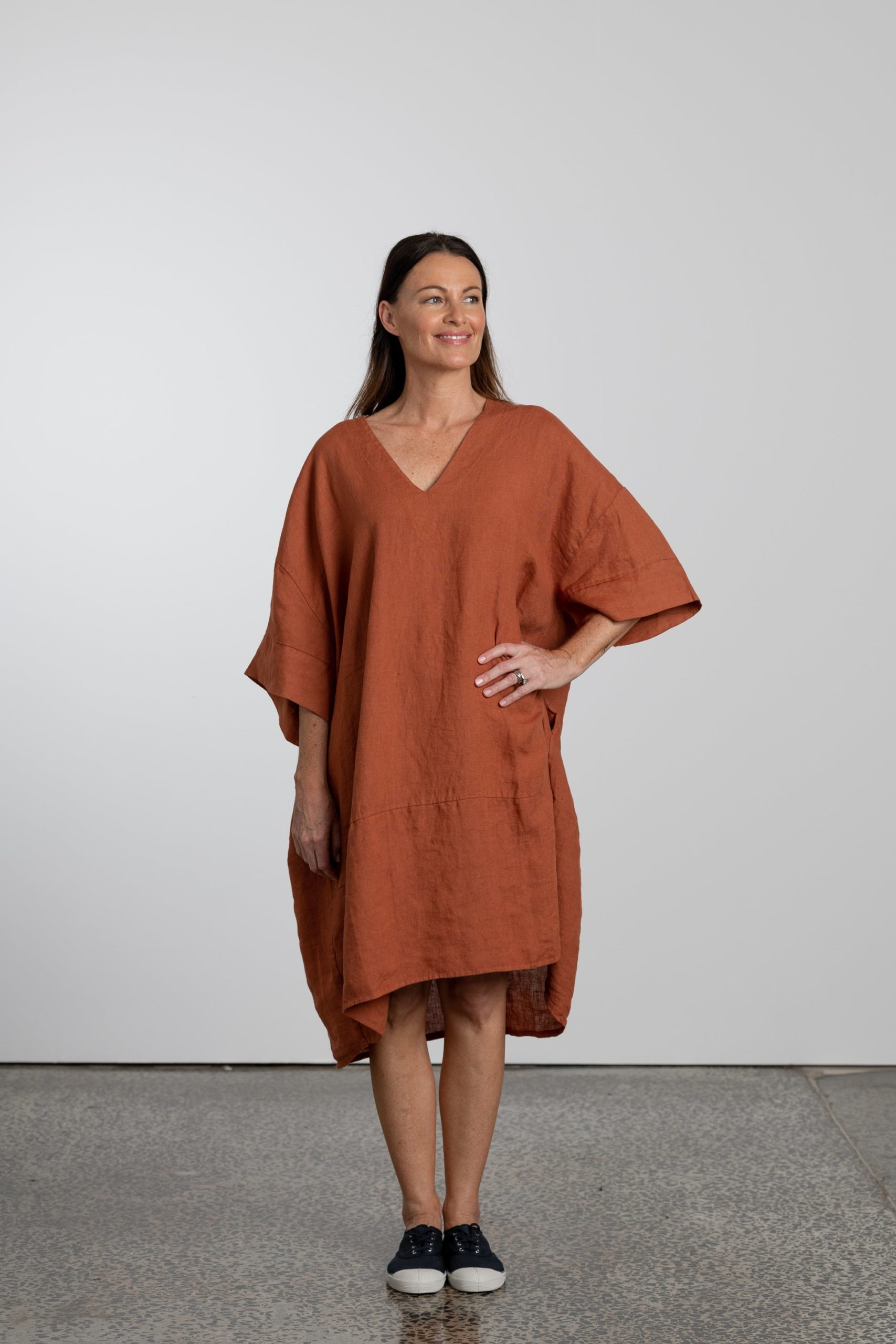 https://thedressingroom.co.nz/wp-content/uploads/2021/11/Natural-Linen-Oversized-Tunic-Dress-Front-scaled.jpg